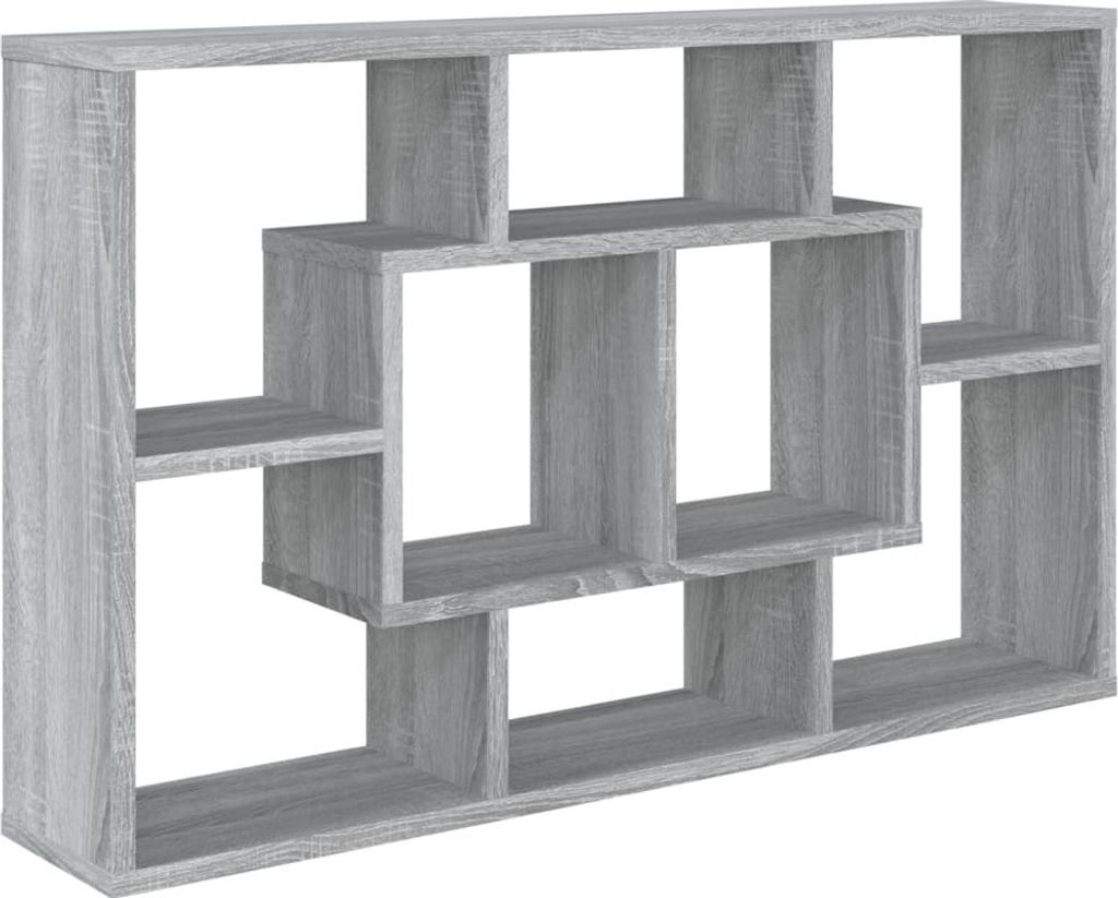A gray wooden geometric shelf unit against a white background.
