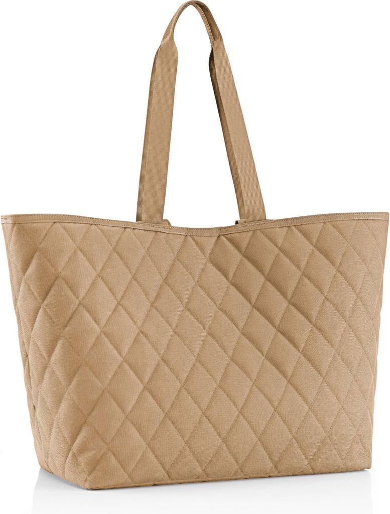 A quilted shopper bag on a white background.