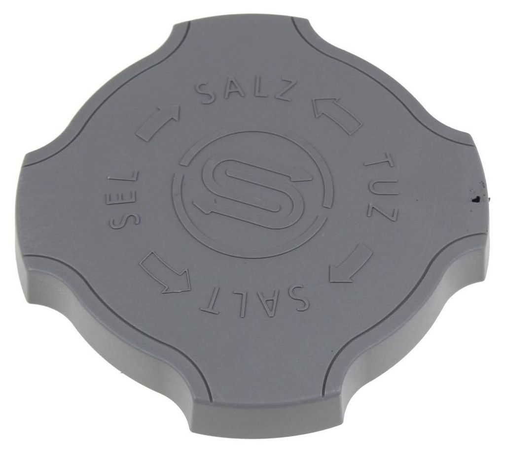 A gray cap with text and arrows indicating direction.