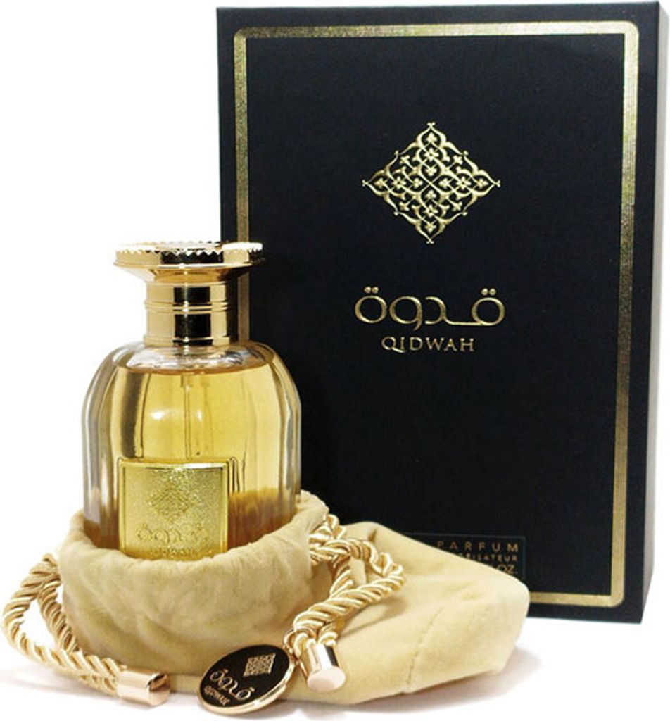 A bottle of perfume and its packaging are displayed against a white background.