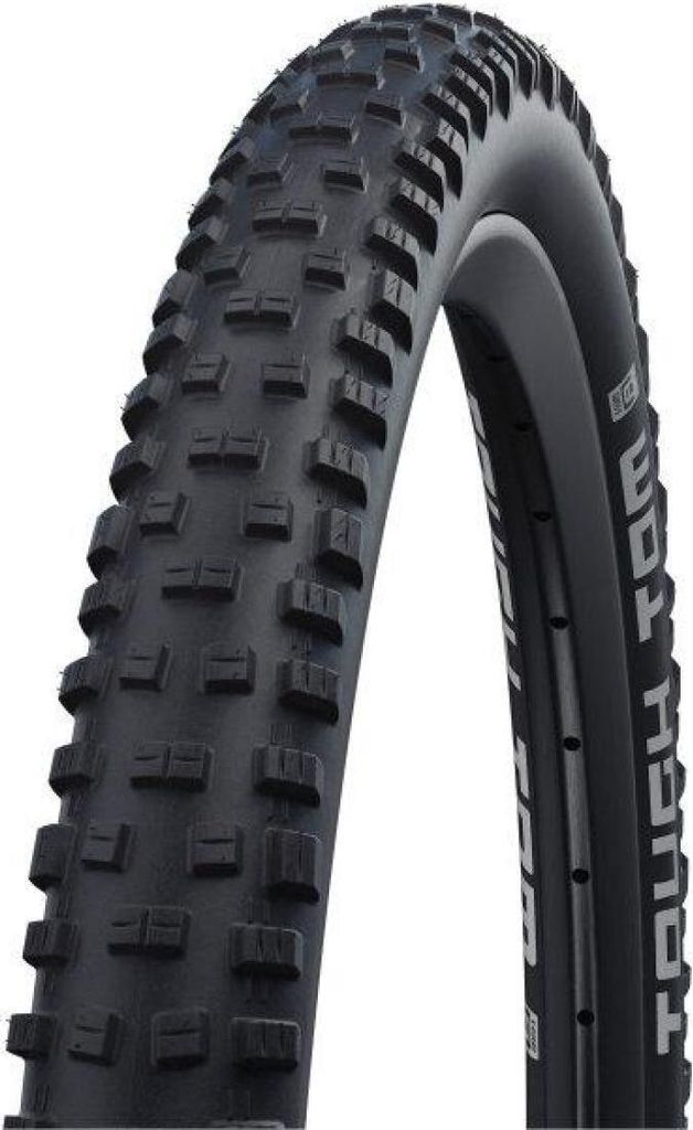 A close-up studio shot of a black bicycle tire.