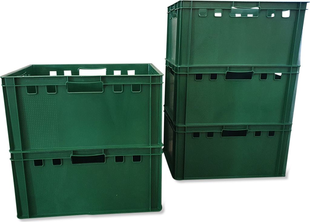 A stack of green plastic crates on a white background.