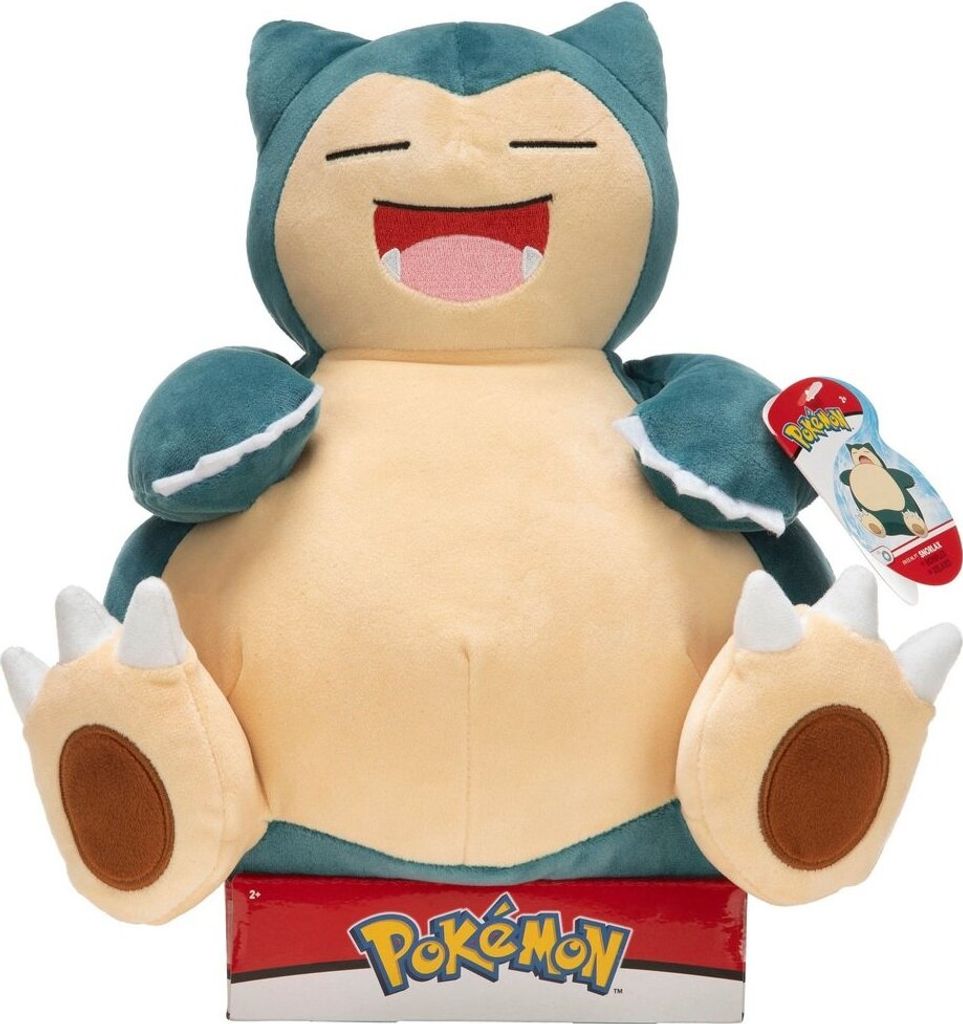 A plush toy of the Pokemon character Snorlax is displayed on its packaging.