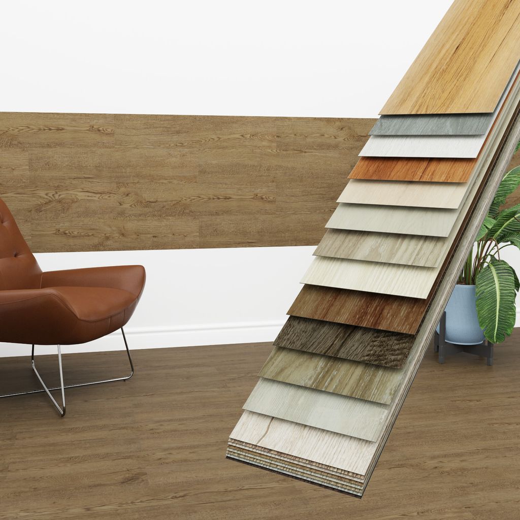 A collection of vinyl flooring samples displayed in front of a chair and a wall panel.