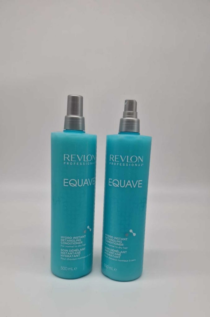 Two turquoise spray bottles of Revlon Professional Equave Hydro Instant Detangling Conditioner are shown against a white background.