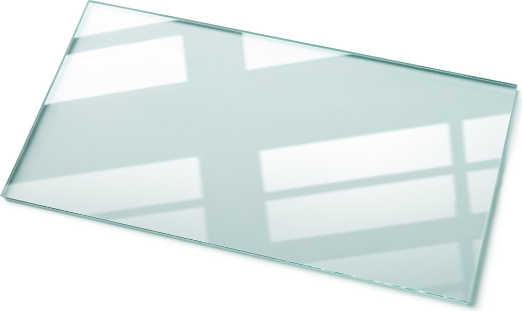 A rectangular glass tabletop is shown from a diagonal angle against a white background. Light reflects off the surface, creating patterns that suggest window panes.