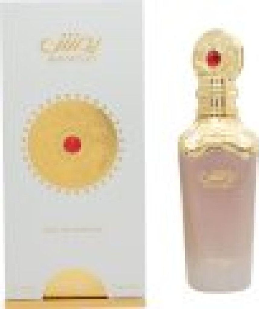 A perfume bottle and its packaging are shown side-by-side against a white background.