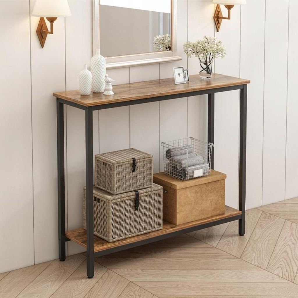 A console table with storage boxes and decorative items.