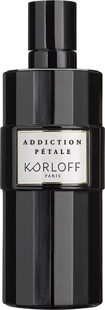 A black perfume bottle with a silver label.