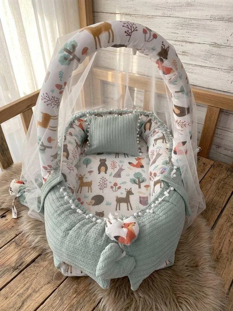 Nid bébé avec moustiquaire amovible et arche de jeux en coton doux