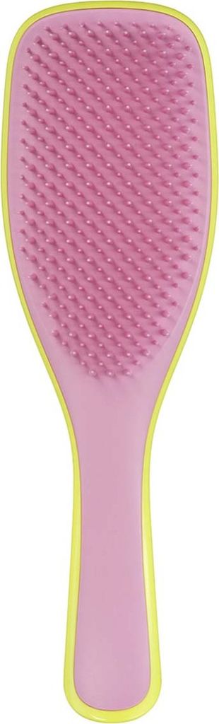A pink and yellow hairbrush is shown against a white background.