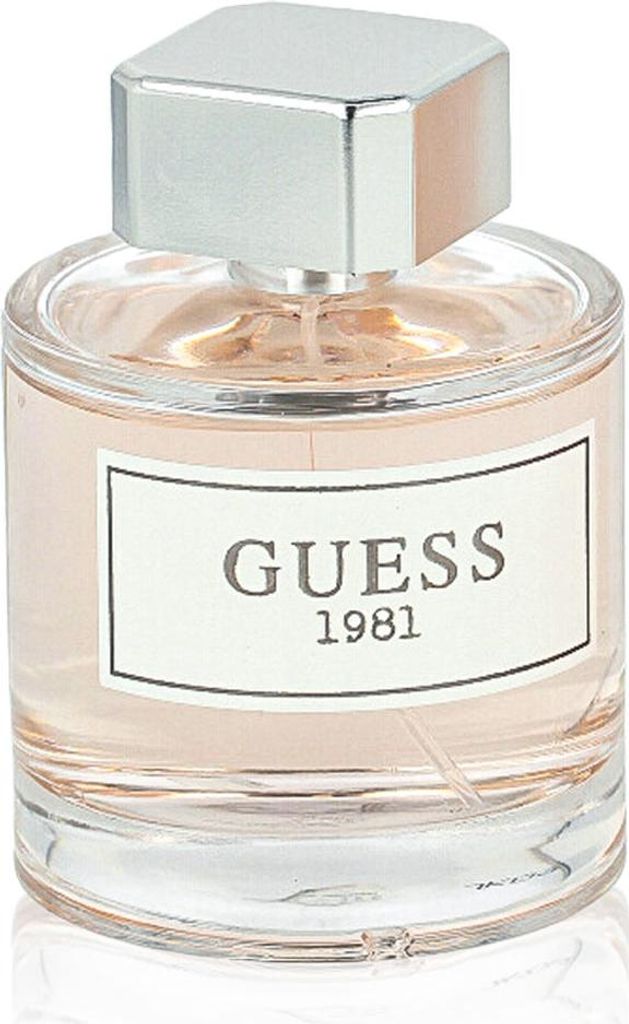 A close-up studio shot of a perfume bottle.
