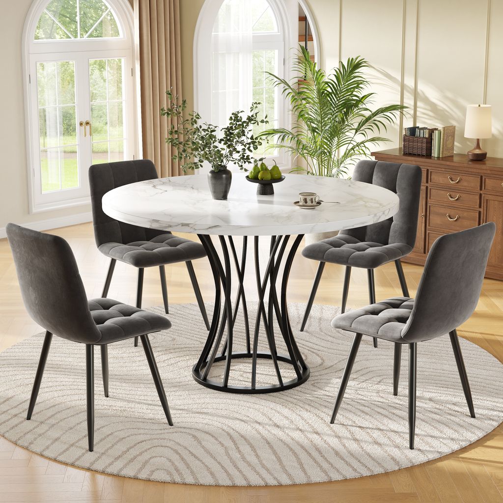 A dining table and chairs set in a well-lit room with large windows and a wooden cabinet.