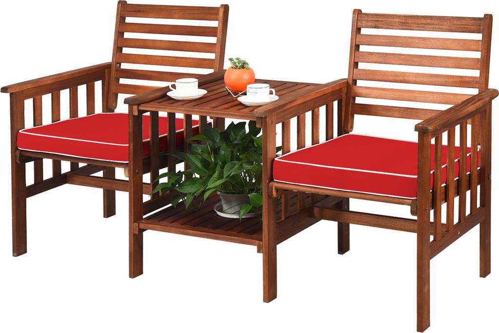 A wooden garden bench with red cushions and a small table with two cups and a plant.