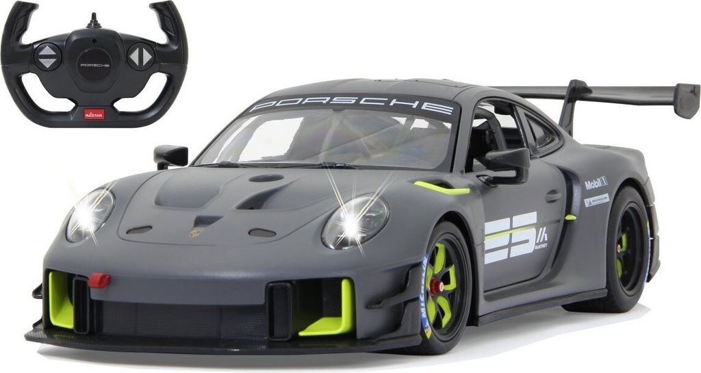 A remote-controlled Porsche 911 GT2 RS Clubsport 25 toy car and its steering wheel controller are shown against a white background.