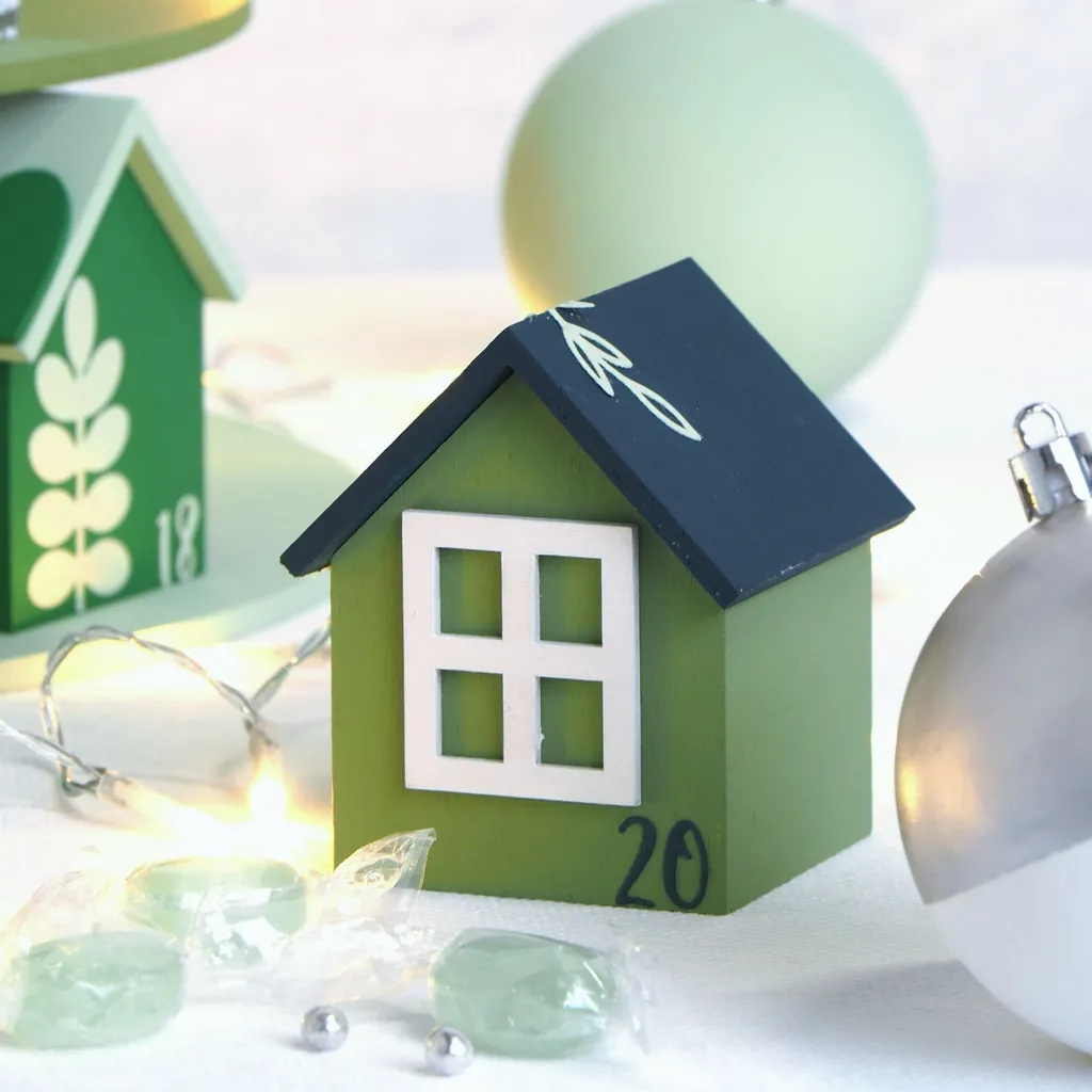 Calendrier de l'Avent en maisons de bois à décorer et à remplir soi-même