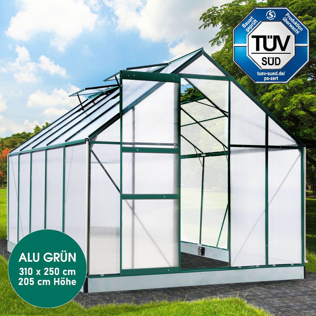 A green aluminum greenhouse with transparent panels, set outdoors on a paved area with grass and trees in the background. A TÜV SÜD certification logo is visible in the top right corner.