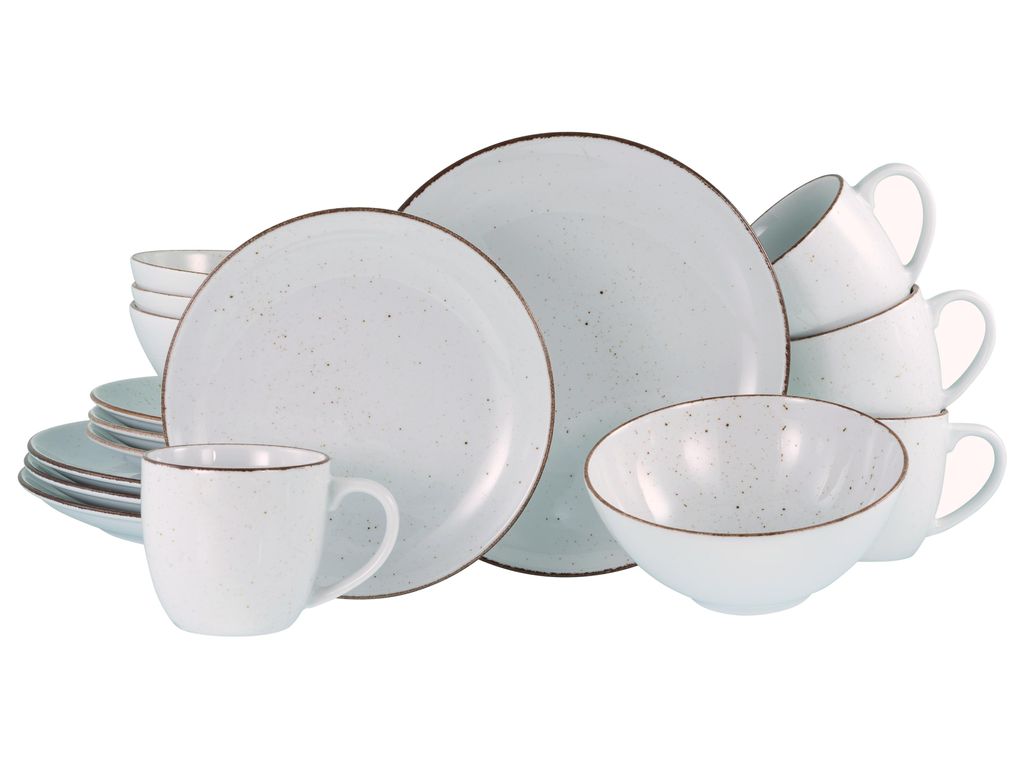 A collection of white ceramic dishes and mugs with a speckled pattern and brown trim, arranged on a white background.