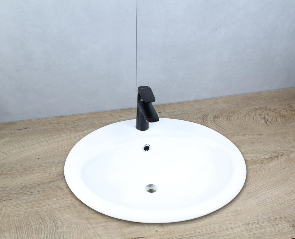 Keramik Waschbecken oval 570x485x195 mm weiß mit Überlauf Produktbild 