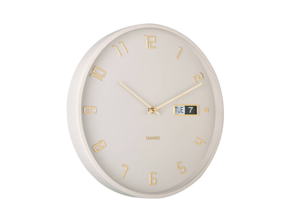 A wall clock with a date display.