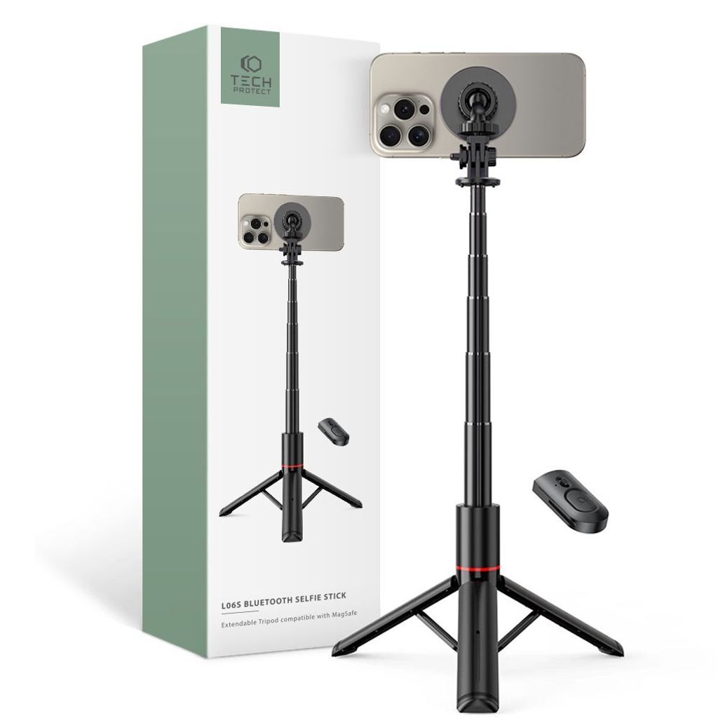 A product shot of a black selfie stick with a tripod base, a smartphone attached, and a remote control, next to its packaging.