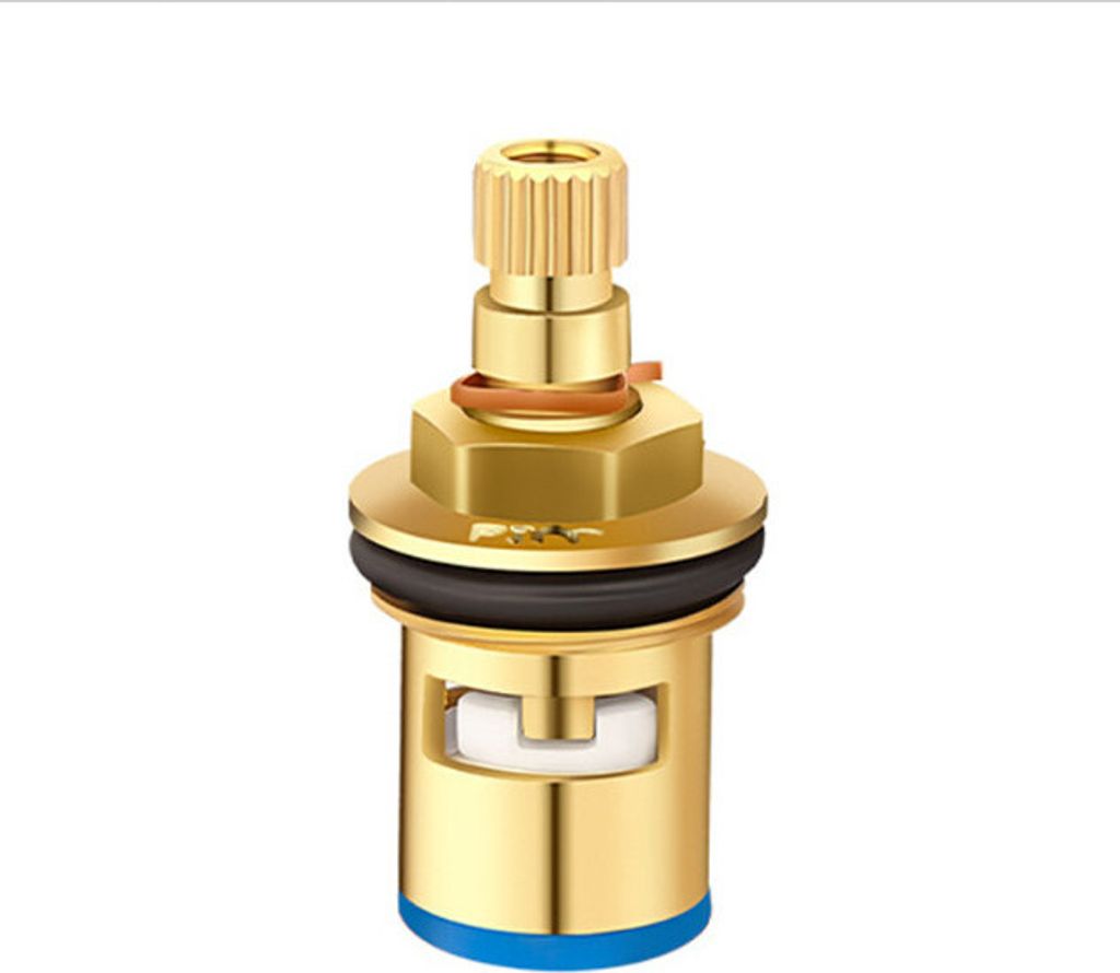 A close-up studio shot of a brass faucet valve cartridge against a white background.