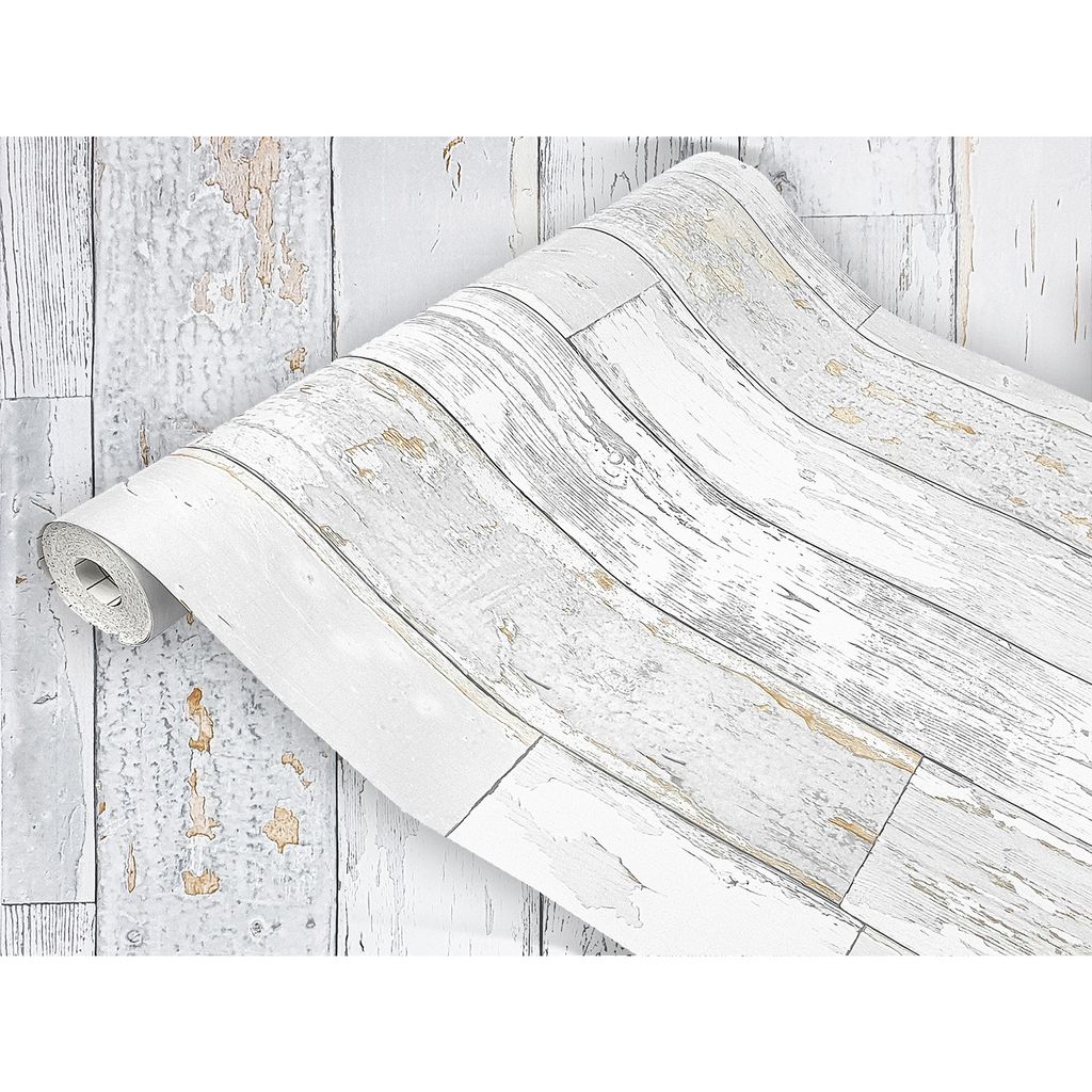 A roll of wood-effect wallpaper is partially unrolled, showing a distressed white wood plank design.