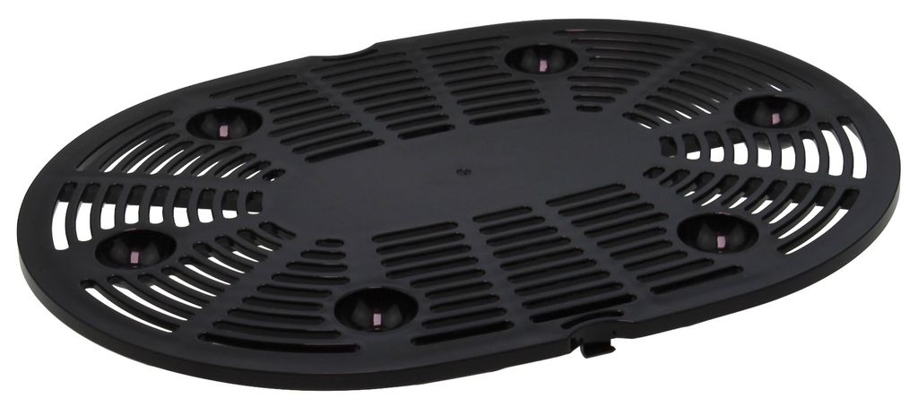 A black plastic grate with multiple circular indentations and slotted openings, viewed from a slightly elevated angle.