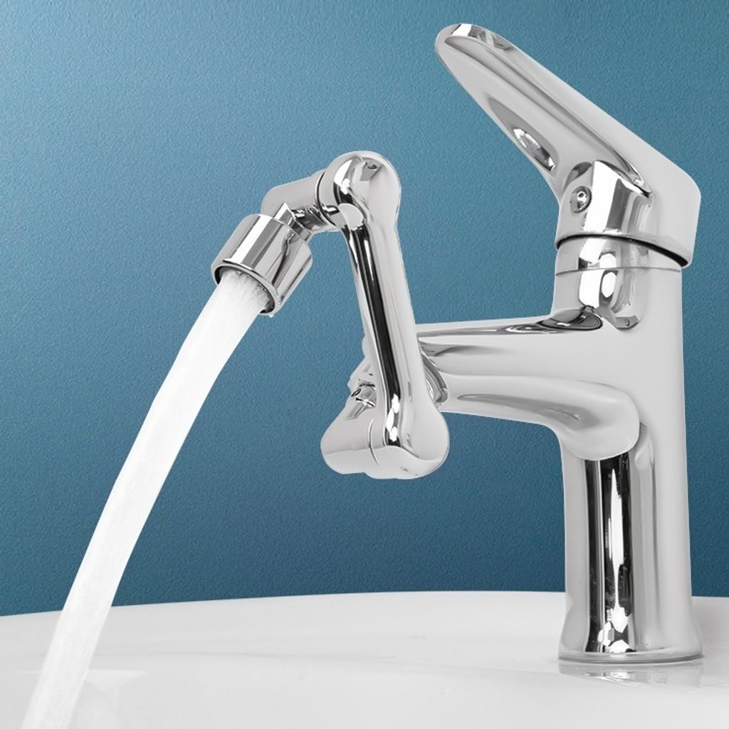 A close-up shot of a chrome faucet with water flowing from it.