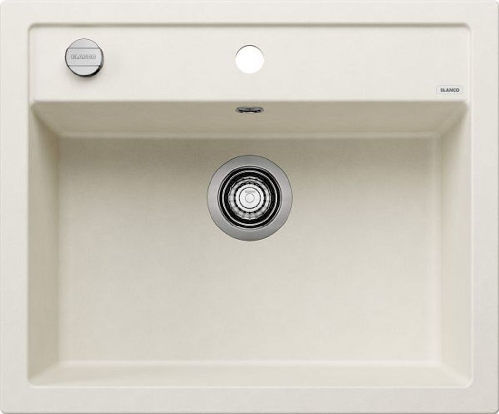 A top-down view of a cream-colored kitchen sink with a drain and faucet holes.
