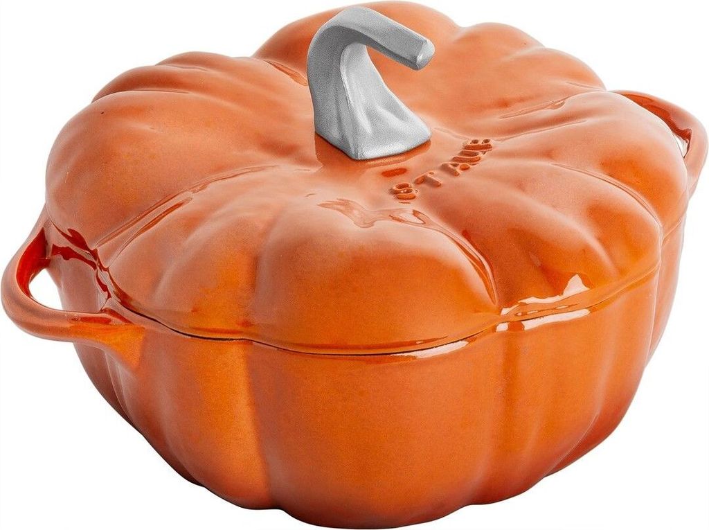 A Staub pumpkin cast iron pot in cinnamon color.