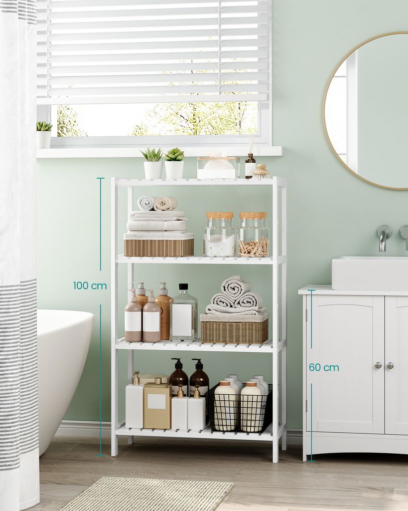 A white shelving unit filled with toiletries and towels in a bathroom.