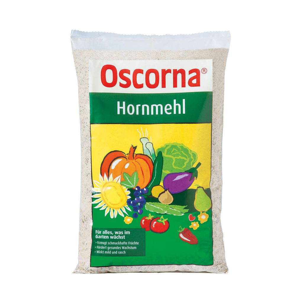 A bag of Oscorna Hornmehl fertilizer with illustrations of vegetables and fruits.