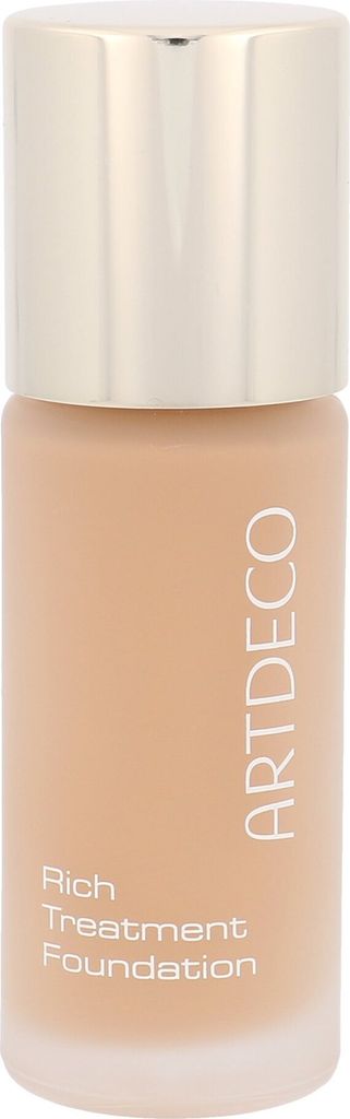 A close-up studio shot of a bottle of foundation.