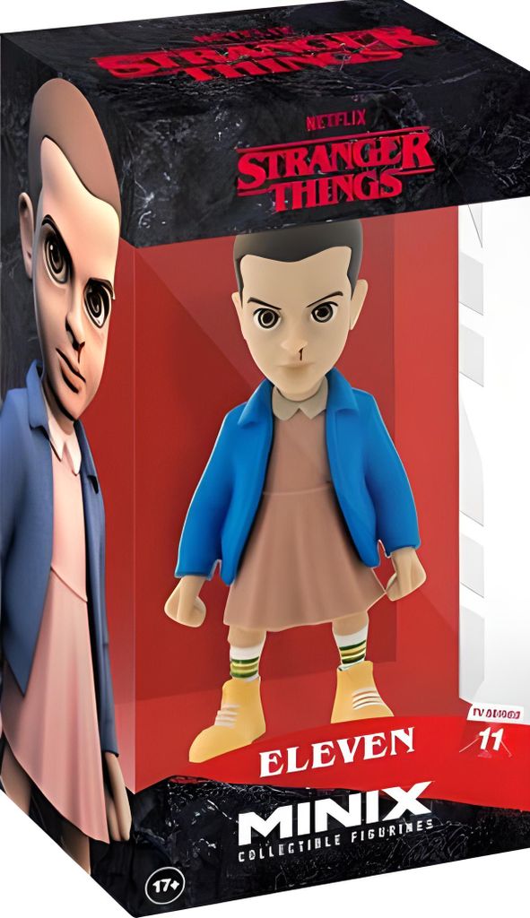 A collectible figurine of Eleven from Stranger Things, displayed in its packaging.