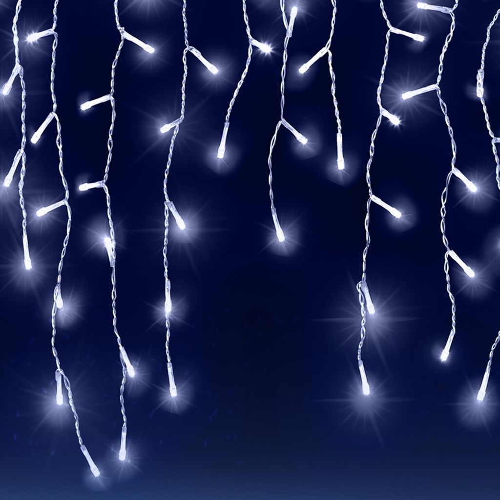 Icicle lights hanging against a dark blue background.