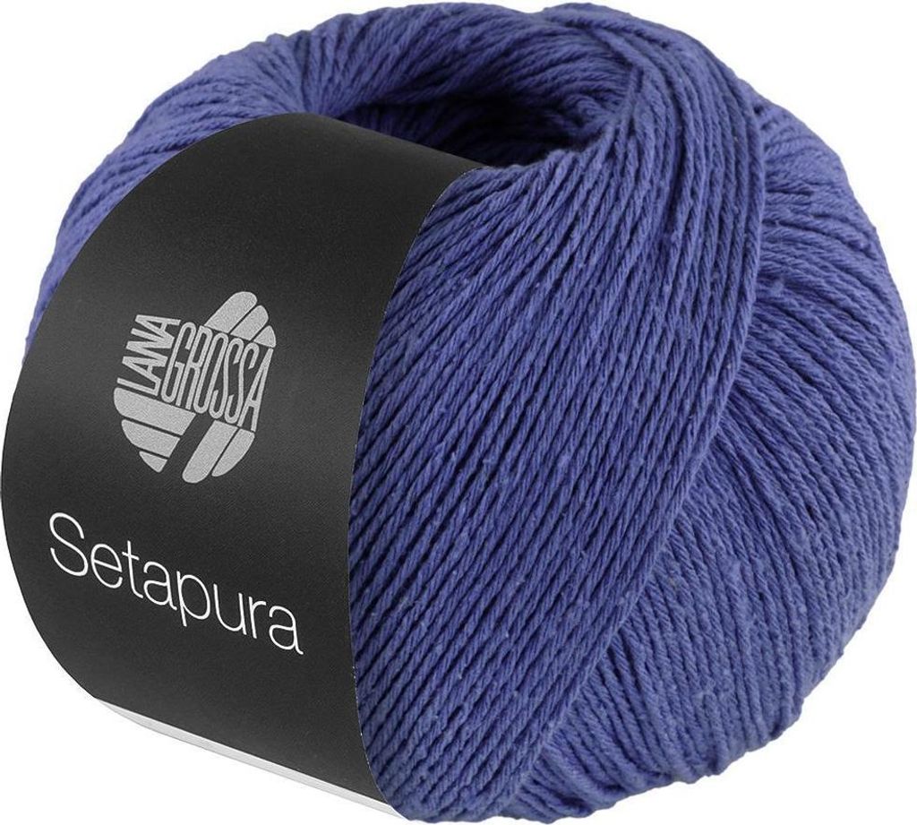 A ball of blue yarn with a black label.