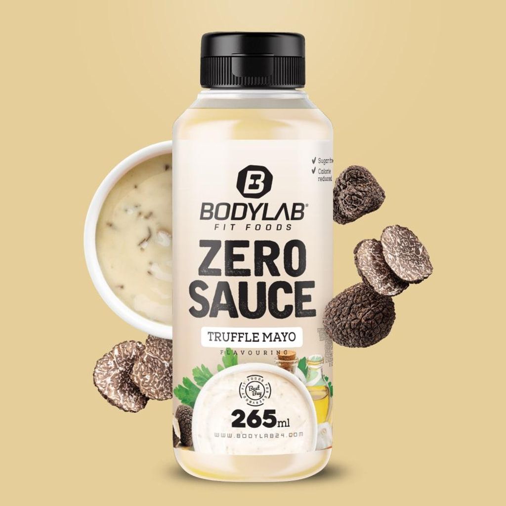 A bottle of BODYLAB Zero Sauce - Truffle Mayo Flavouring, surrounded by truffles and a bowl of sauce.