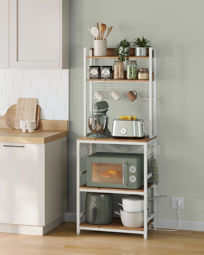 A kitchen baker's rack filled with various kitchen appliances and accessories.