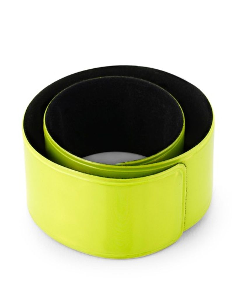 A neon yellow snap armband rolled into a circle on a white background.