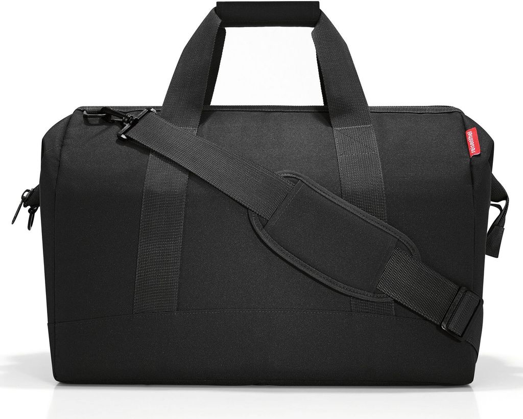 A black duffel bag is shown against a white background.