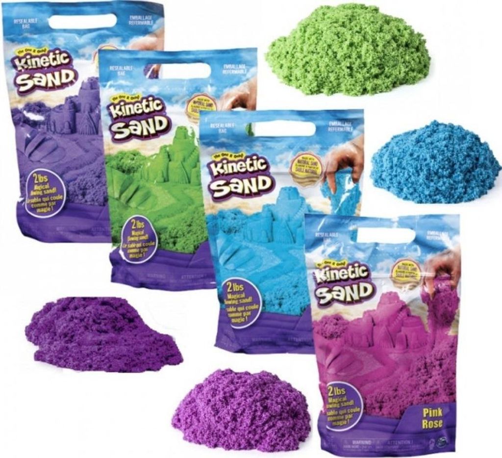 A collection of bags and piles of kinetic sand in various colors.