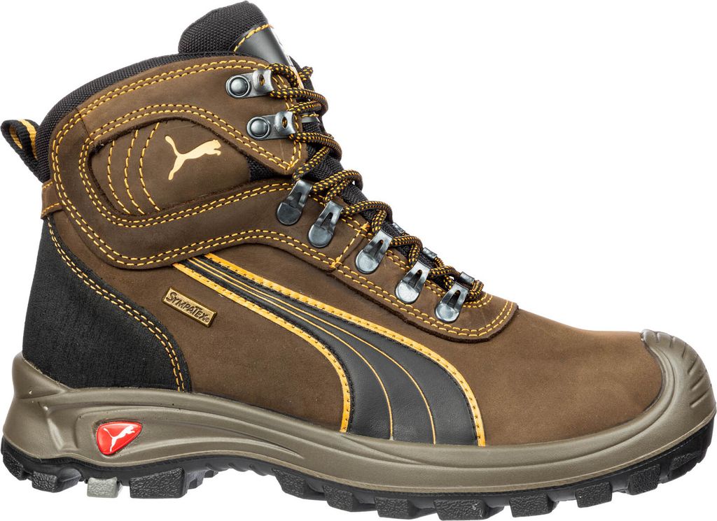 A single brown Puma work boot is shown against a white background.