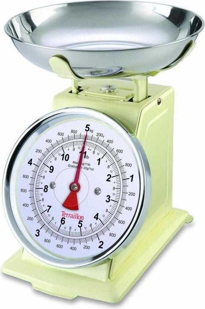A retro-style kitchen scale with a silver bowl and a cream-colored body.