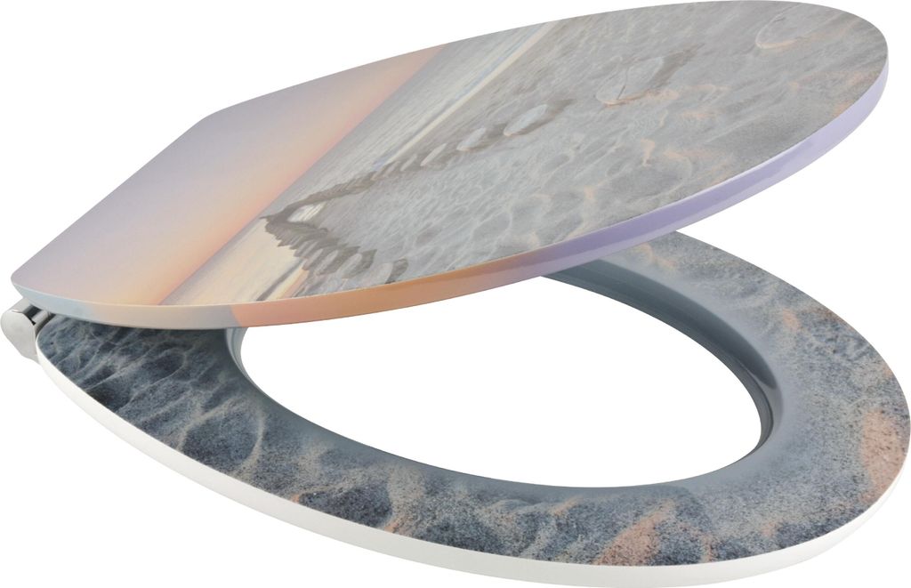 A toilet seat lid and ring with a sandbank image printed on them, shown from a diagonal angle.