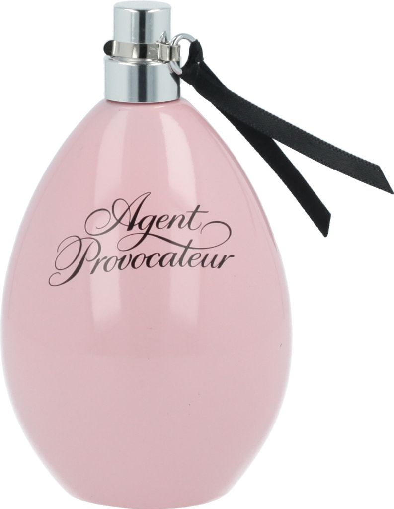 A pink perfume bottle with a silver cap and a black ribbon.