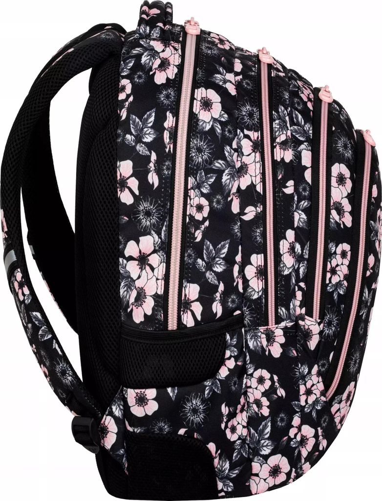 A side view of a black backpack with a floral pattern of pink and white flowers.
