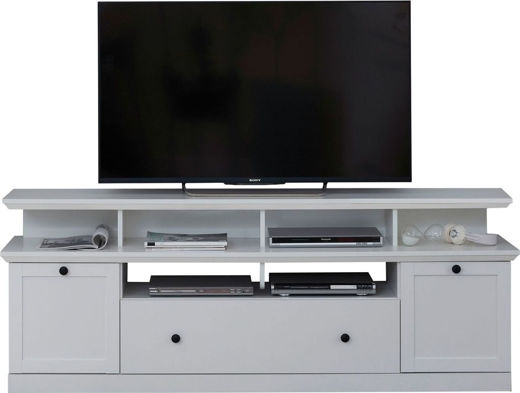 A white TV stand with a black television on top, against a white background.