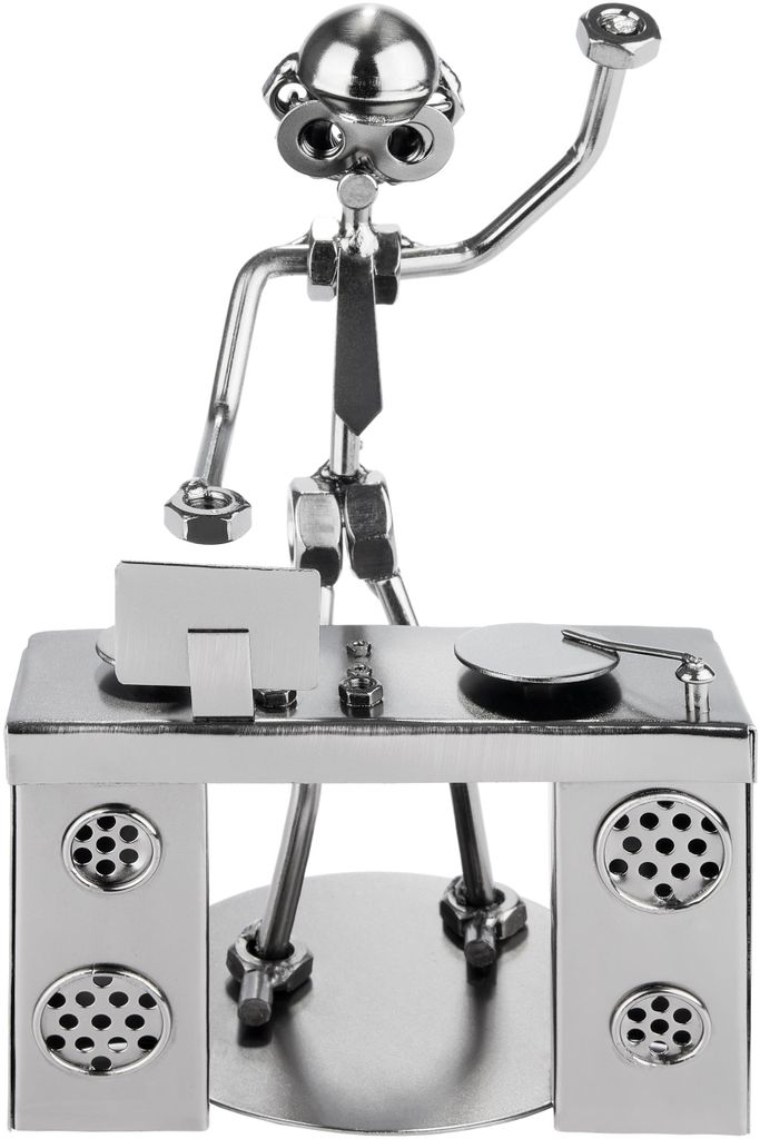 A metallic figurine of a DJ at a console with speakers.