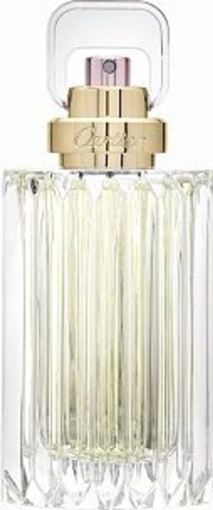 A close-up studio shot of a perfume bottle.